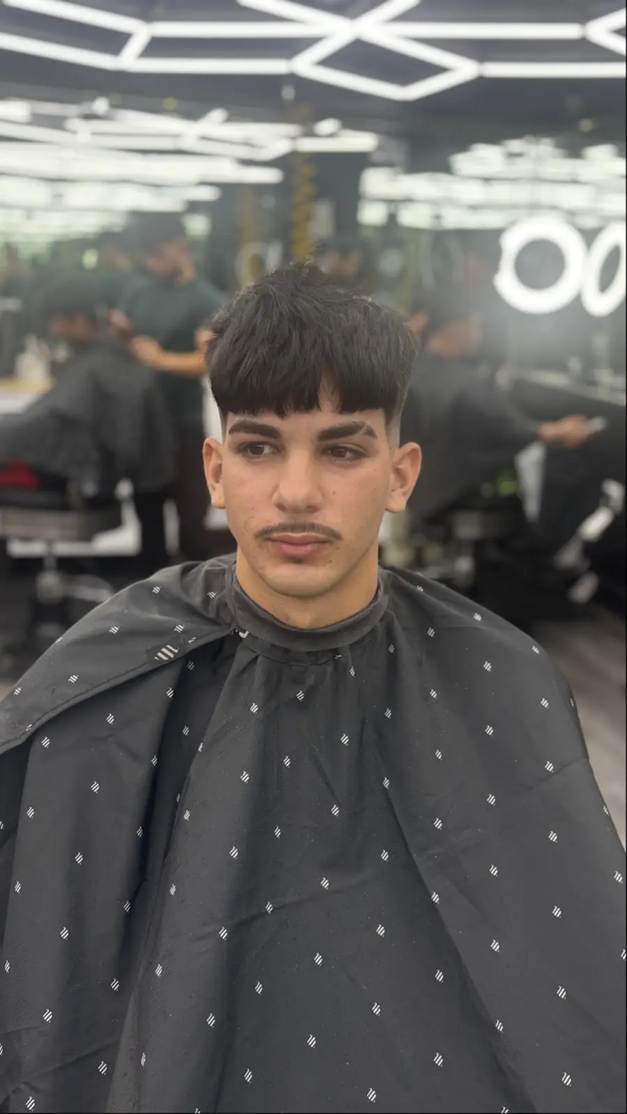 Mid fade with textured fringe